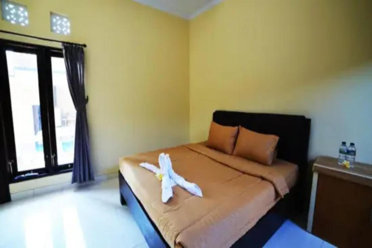 Oyo Flagship 91237 Ratu Guest House Kedunganan Exterior photo